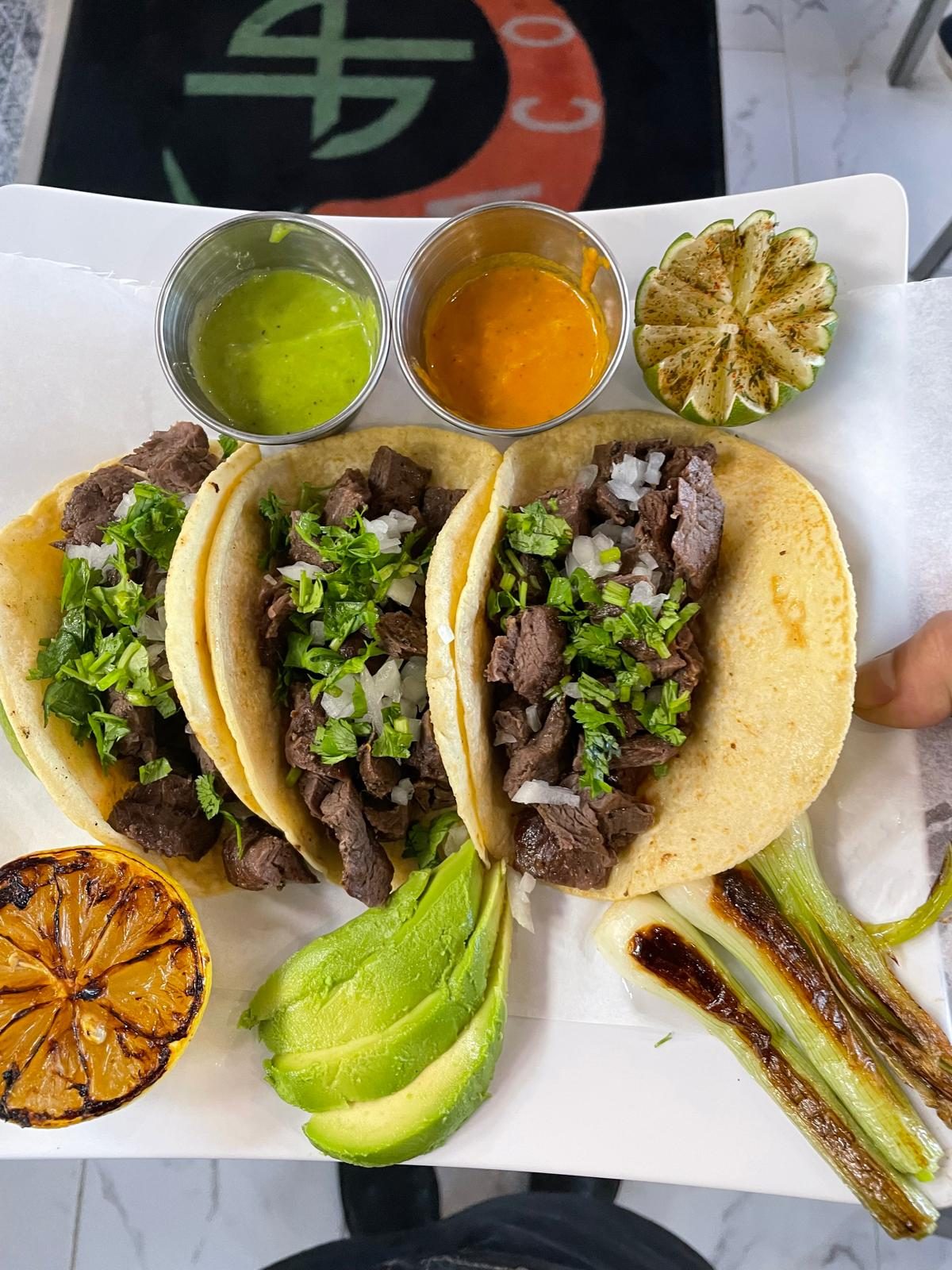 Tacos with lime and salsa